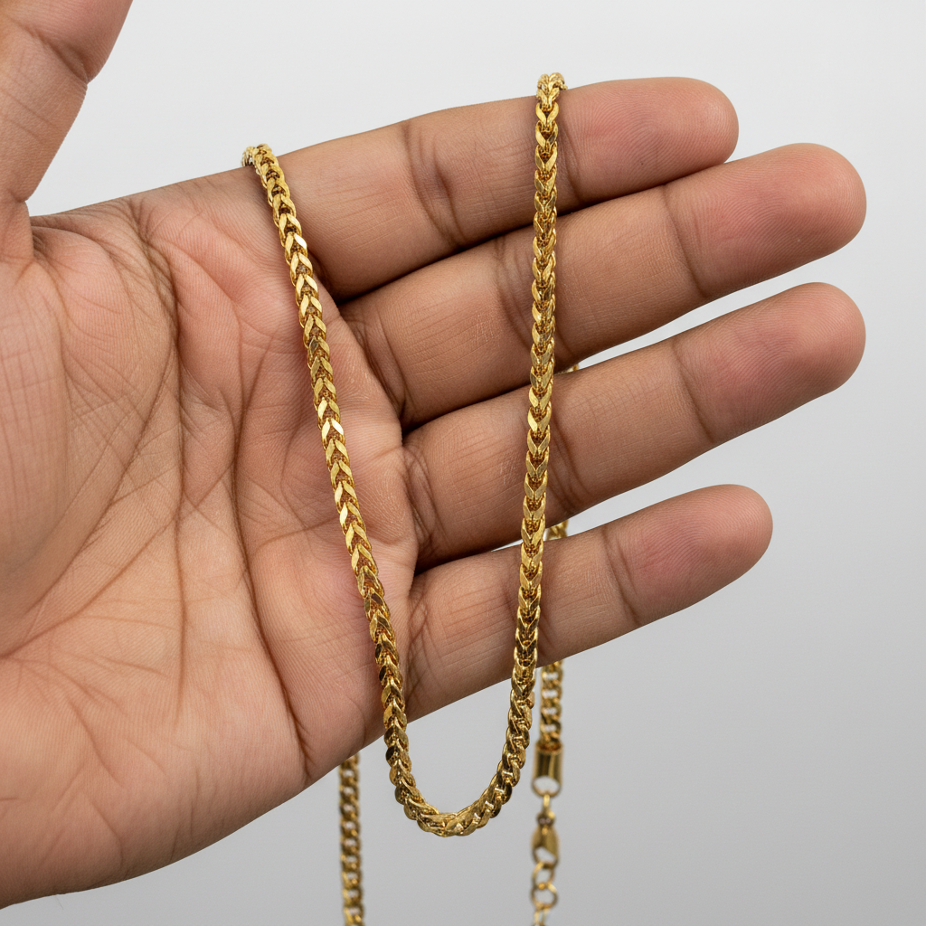 Customer POV - hand holding gold wheat chain